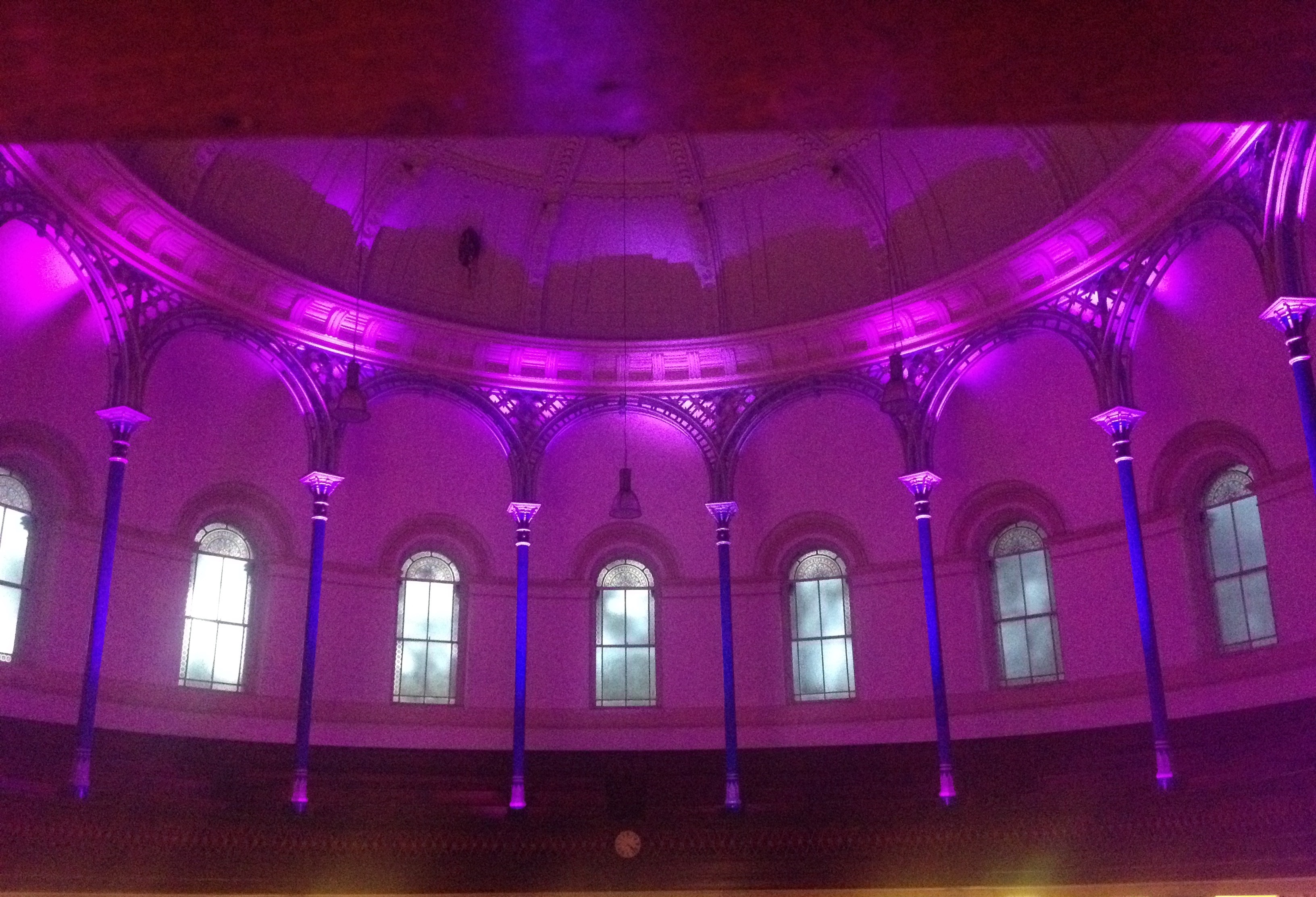 Uplighting pillars at a wedding.