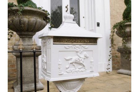 white floorstanding postbox